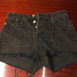 Distressed black denim shorts